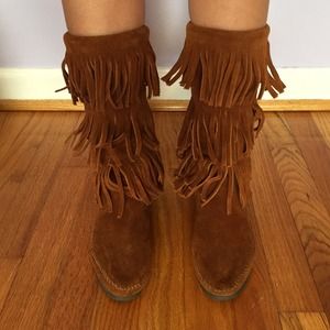 Minnetonka layered fringe boots.