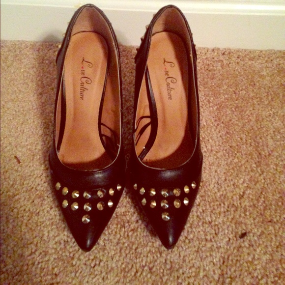 Black studded pumps