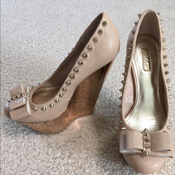 Wild pair nude/gold spiked wedge heels