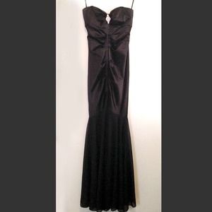Simple and elegant black strapless gown