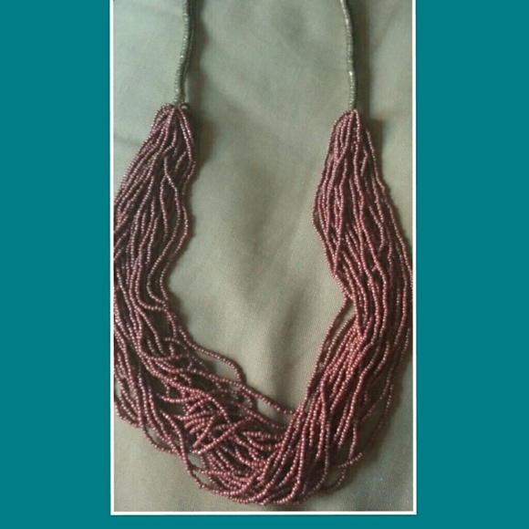 Coral colored beaded necklace