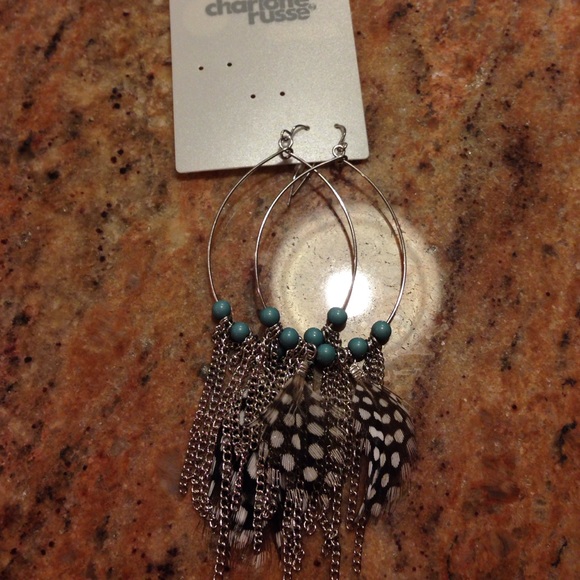 Brand new feather earrings