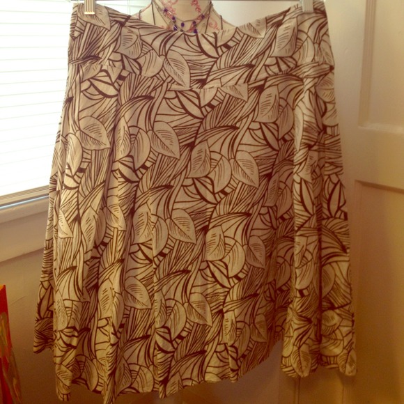 Cream and brown leaf pattern skirt.