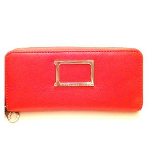 Marc by Marc Jacobs orange wallet.