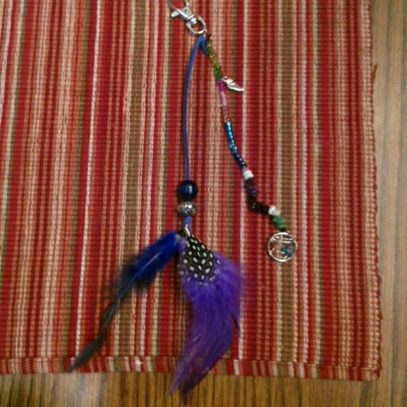 Handmade Spirithood ear tag feather clip