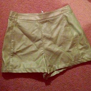 Green leather shorts