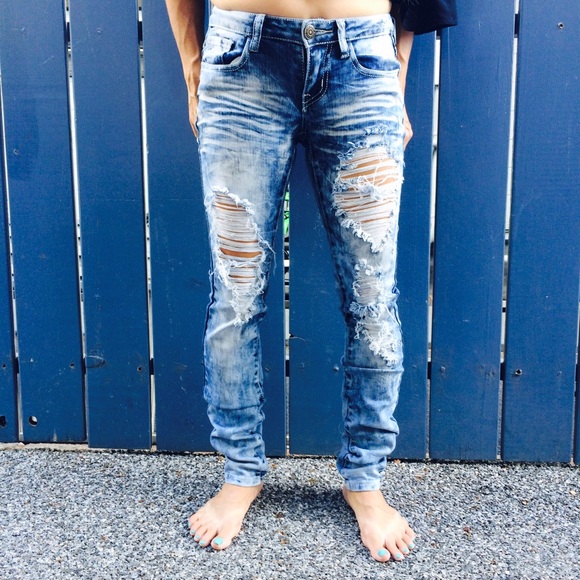 Distressed denim jeans