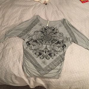 3/4 length grey embellished shirt.