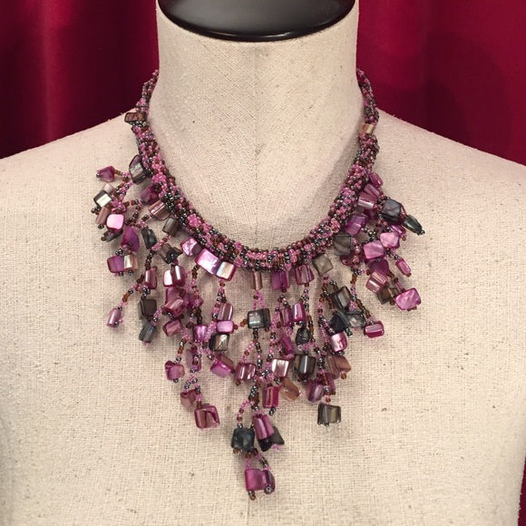 Handmade African choker with purple stones.