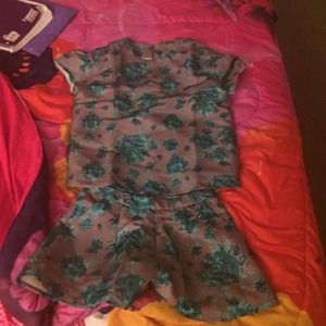 A green and gray 2pc shirt and shorts from Zara.