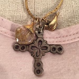 Hand made leather rope necklace with hoops and charms.