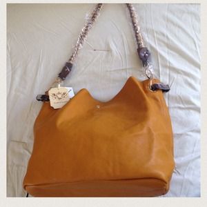Mustard colored bucket bag