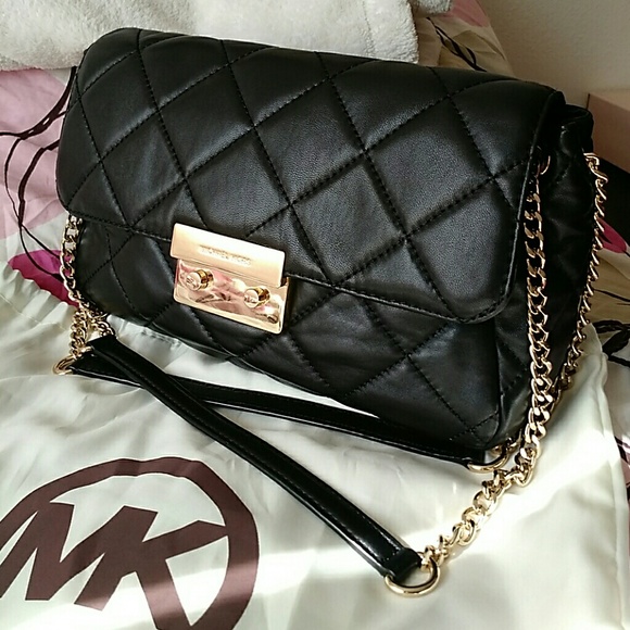 S O L D.    Mk quilted bag