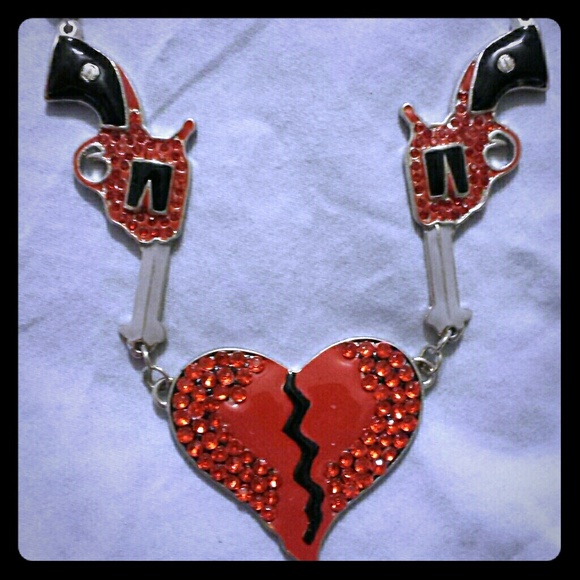 Broken hearts and gun necklace