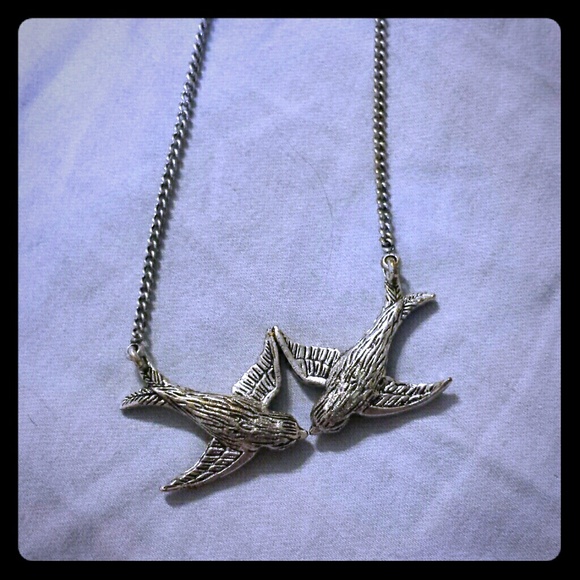 Fossil sparrow necklace