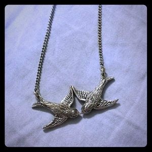 Fossil sparrow necklace