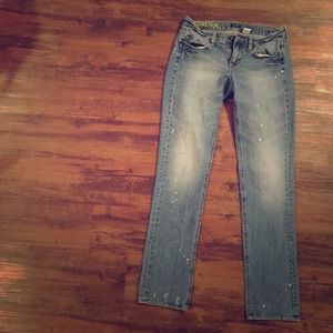 Straight legged destroyed denim