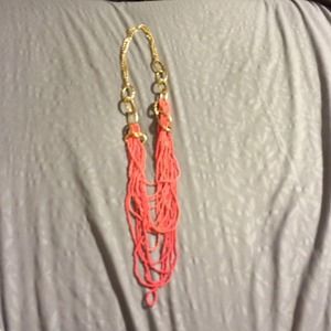 Coral with gold necklace