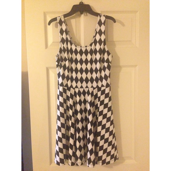 Black and white checkered pattern dress.
