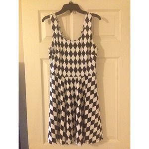 Black and white checkered pattern dress.