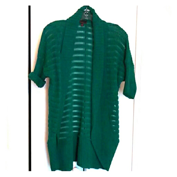 Green sweater.