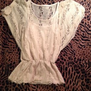 Biege see through shirt with built in cami.