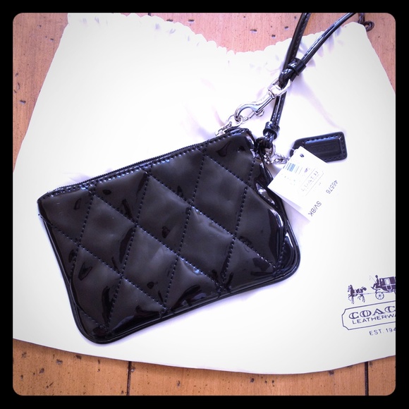 NWT never used Coach Wristlet!