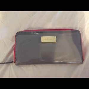 Pink and grey Steve Madden wallet and sunglasses