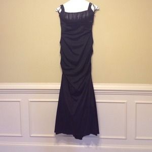 Black Gown goes to the floor, beautiful