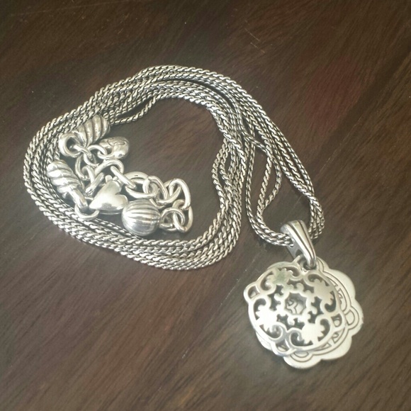 Two sided swirl pendant necklace