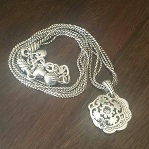 Two sided swirl pendant necklace