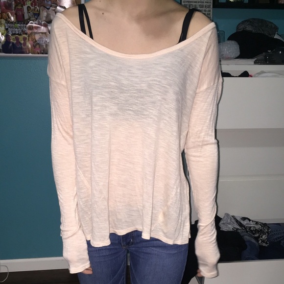Light pink top with wide neckline