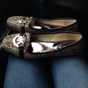 Brand new Micheal Kors flats.