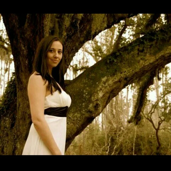 White dress with black sash