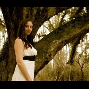 White dress with black sash