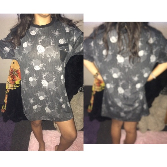 an oversized black dress with grey roses