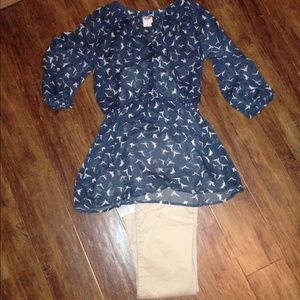 Sheer blouse with birds.