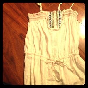 Cute tank with a pretty design at the top!