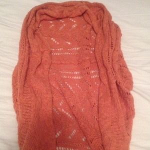 Orange knit sweater vest