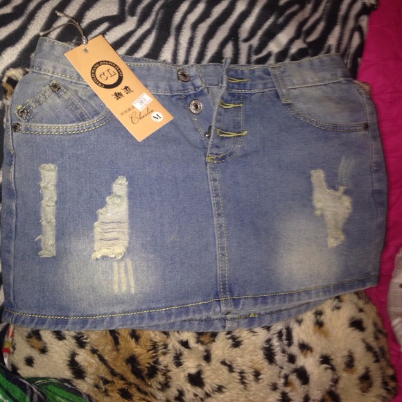 Denim distressed mini skirt