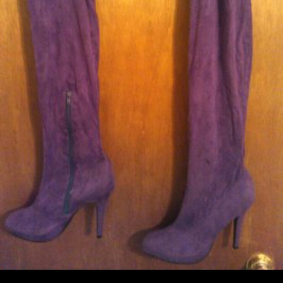 Thigh high purple boots