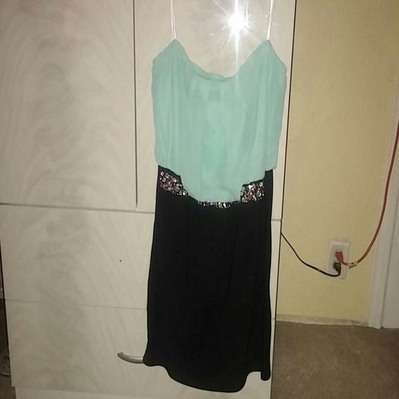 Turquoise and black dress.