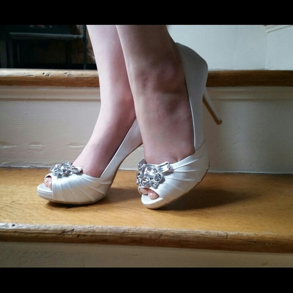 White heels with gem detail