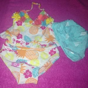 Toddler girl 2 piece bathing suit with cap.