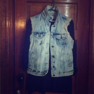 Distressed denim vest