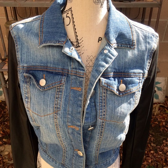 Denim jacket with black leather sleeves