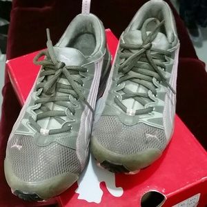 Green with pink puma