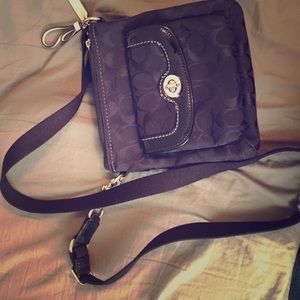 **Authentic**. Small black cross body coach purse