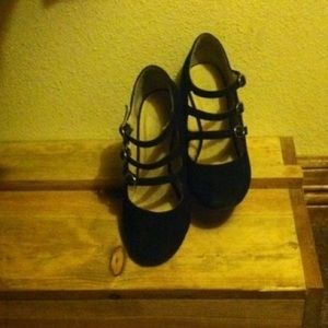 Black strap up heels