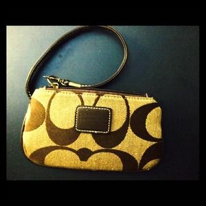 Brown coach wristlet.